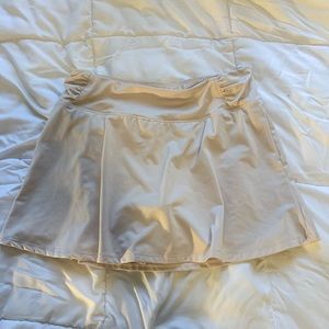light pink almost white tennis skirt